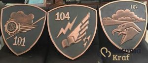 Logo Batalyon 102 tembaga